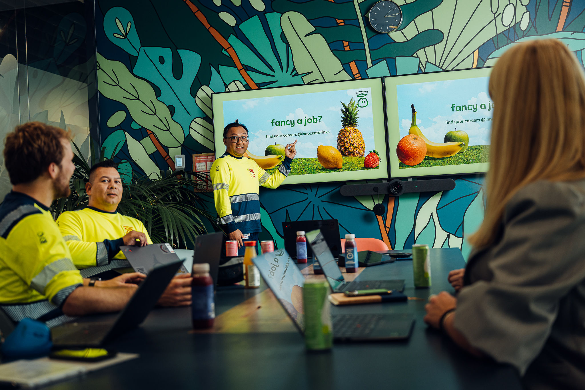 Team meeting in a conference room, presentation about jobs.